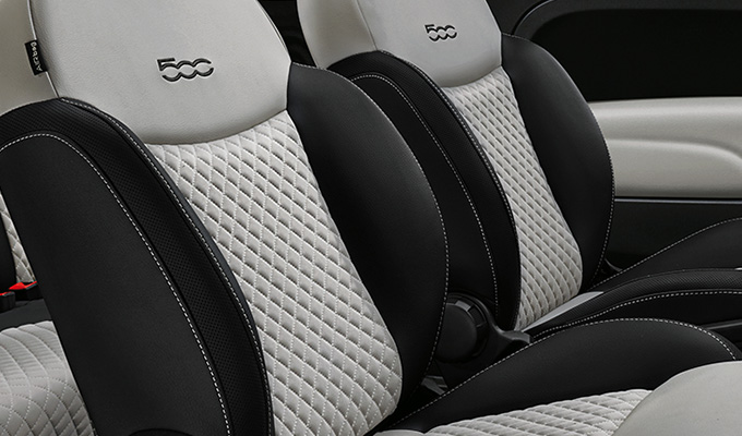Dedicated white sand Matelassé fabric seats with soft touch details